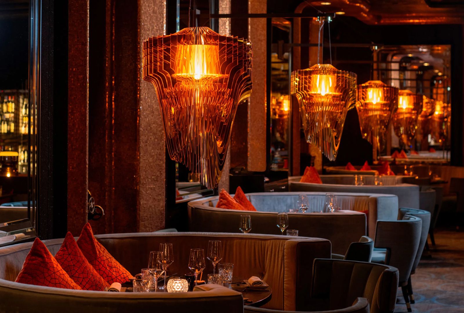 Elegant restaurant interior with plush seating and warm lighting for fine dining
